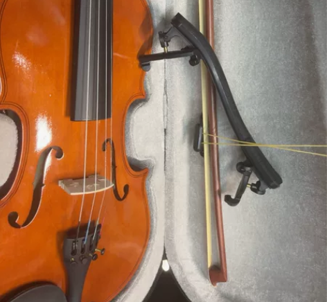 小提琴   买来没用过   就拿着拍过一次...