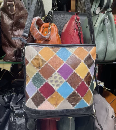 进口头层真皮女包水桶包,复古彩牛皮单肩斜挎...