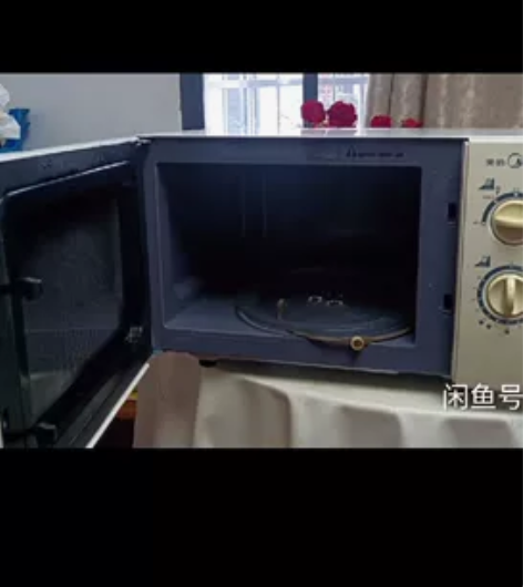 搬家闲置美的微波炉，不想带回去了，成色不错...