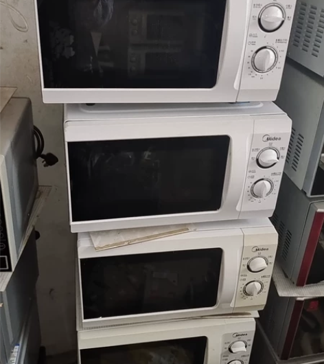 4：美的微波炉:玻璃转盘 ，机械存色如图，...