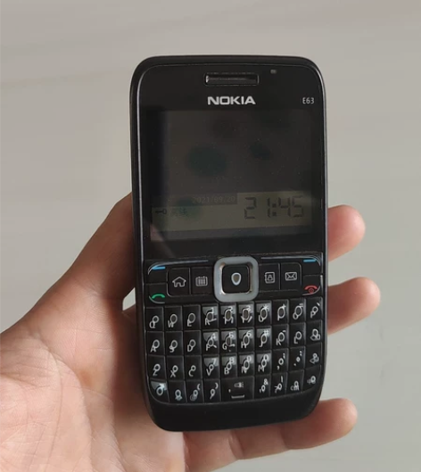 自用诺基亚E63.功能正常.原装电池.带充...