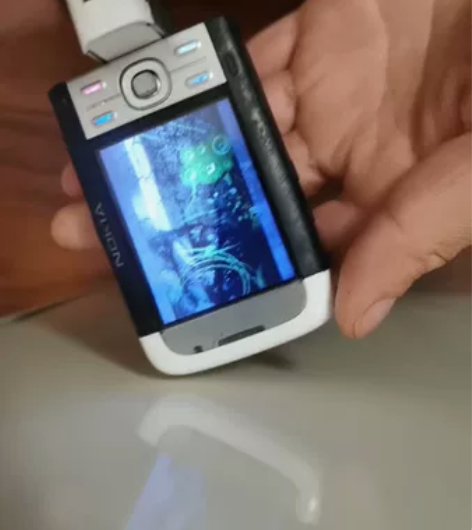 诺基亚5700，扭扭手机，当年的音乐机（上...