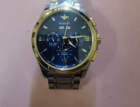 欧品客手表，原价1800那款，低价出，可鉴...