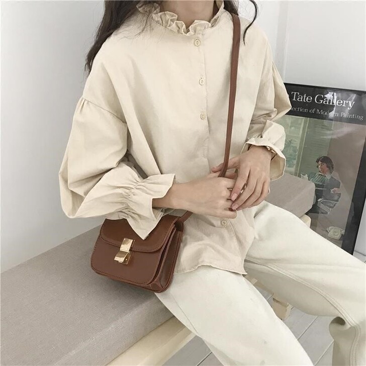 毛衣马甲背心＋木耳边衬衫