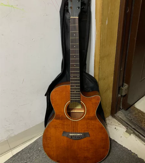 追梦民谣吉他 原木板 送吉他包，限自提??...