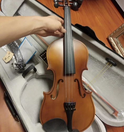 前任送的2000买的4/4实木纯手工小提琴...