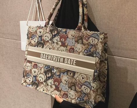 小众原创帆布包包女2021新款卡通图案手提...