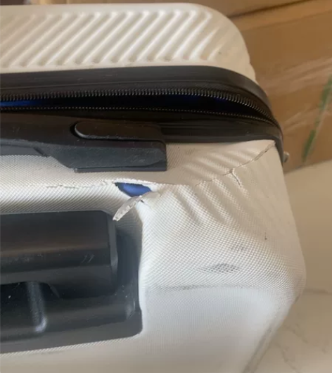 有损坏，不影响正常使用，介意勿联系 拉杆箱...