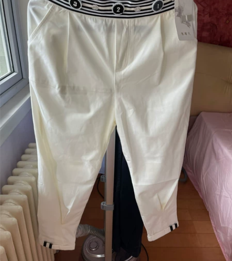 全新带吊牌思蓓儿白色九分长裤 全新带吊牌，...