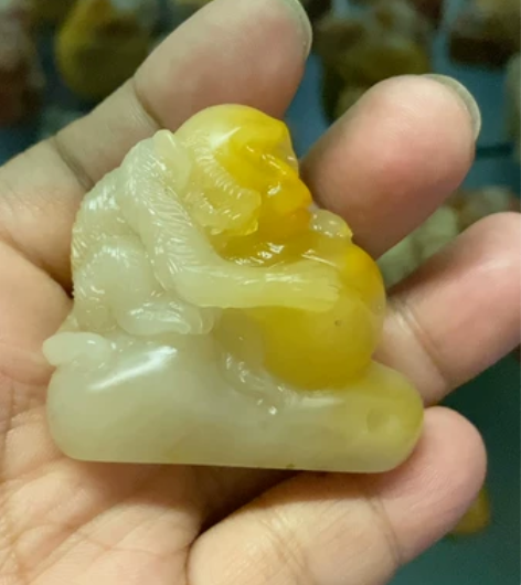 尺寸约4.9/2.7/4.5厘米。老挝石金...