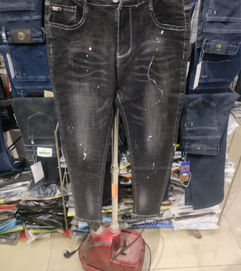 男士31码春秋款微弹力猫爪印设计修身版牛仔...