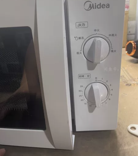 低价出 新款美的机械转盘微波炉  库存不多...
