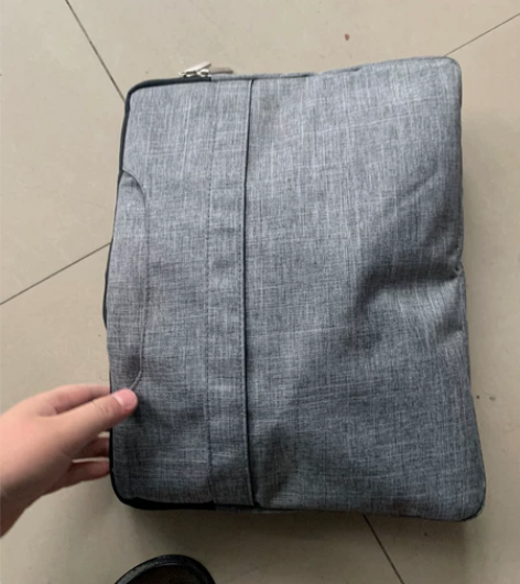 笔记本手提包，外加一个无线鼠标，收拾东西收...