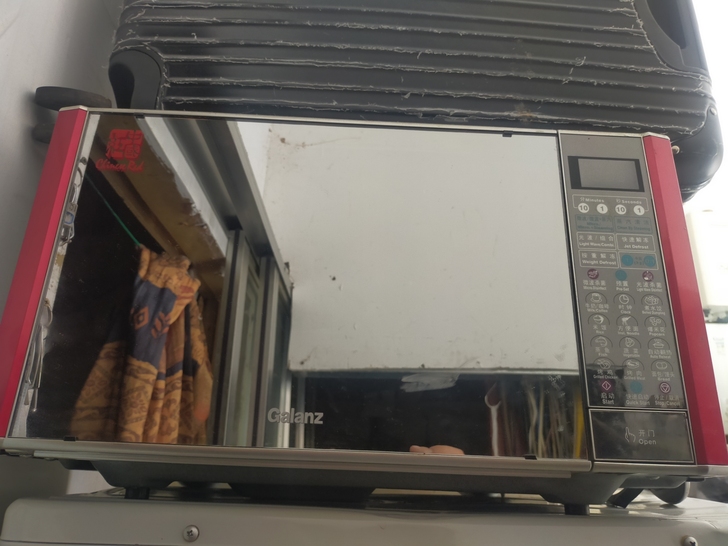 格兰仕微波炉,镜面门,微电脑板控制,不锈钢...