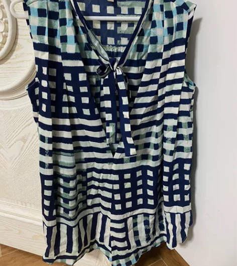 水云间宽松版雪纺背心 感兴趣的话点“我想要...