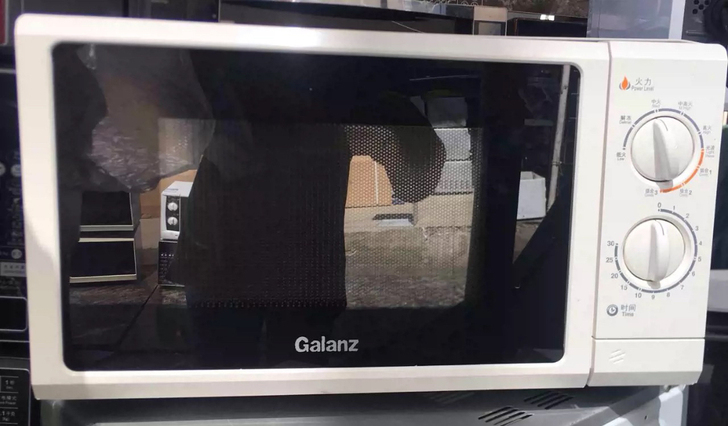 家用新款格兰仕按门微波炉,成色如图,功能完...
