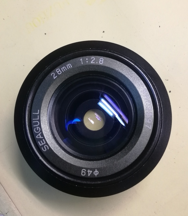 海鸥28㎜2.8光圈和58定焦头出卖。MD...