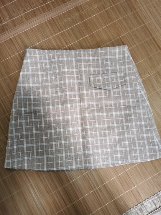 藕粉色格子半身裙A字裙