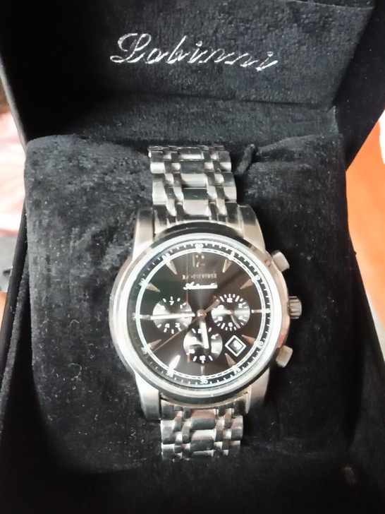 9.5成新闲着没有带，全自动机械表，带夜光...