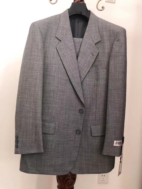 鄂尔多斯产的纯羊毛西服，羊毛含量其中深蓝色...