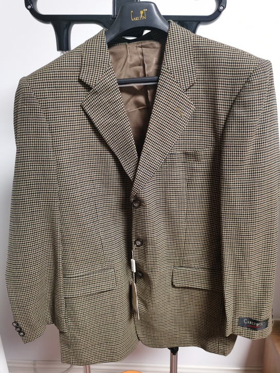 鄂尔多斯产纯羊毛西服，羊毛含量100%，全...