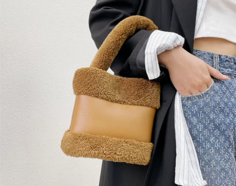 新款菜篮子毛毛女包皮毛一体秋冬款水桶包时尚...