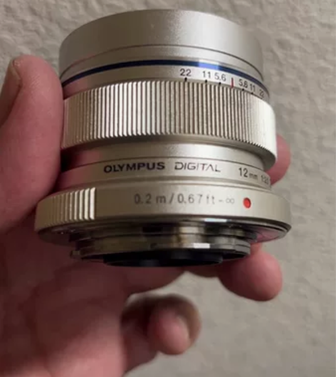 【换机闲置】 银色奥林巴斯12mm/F2超...