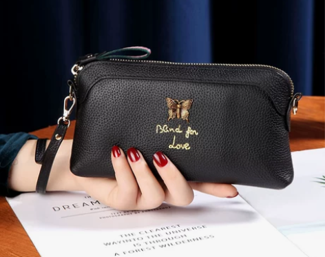 真皮手拿包女休闲百搭2022新款软牛皮单肩...