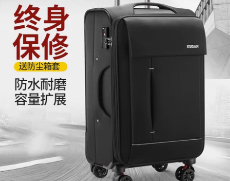 酷感牛津布拉杆箱万向轮行李箱9.9成新，用...