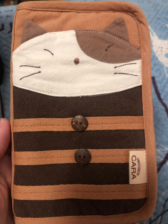 卡拉猫钱包,手拿包。闲鱼买的,买来前是新的...