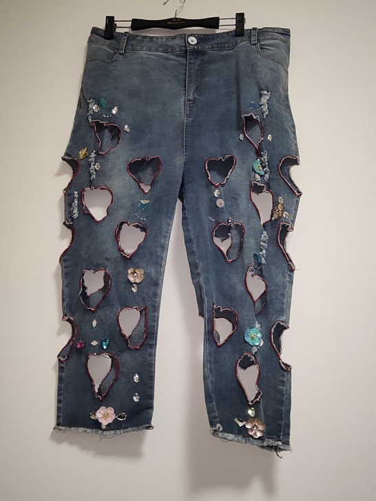 高腰漏洞牛仔裤流行版八分裤大码z14