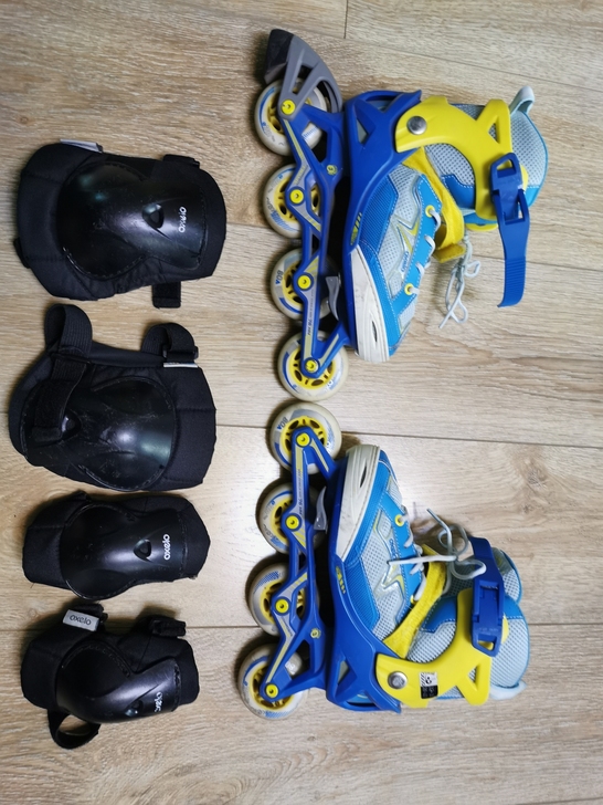 迪卡侬轮滑鞋32-35码可调节，带图中护具...