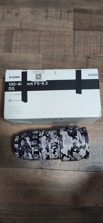 出适马100-400 F5-6.3 DG佳...