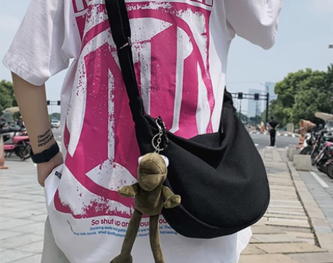 【狂欢价】潮牌斜挎包男士帆布单肩包女生休闲...