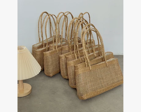 泰国进口黄草纯手工编织镂空草编包法式腋下包...