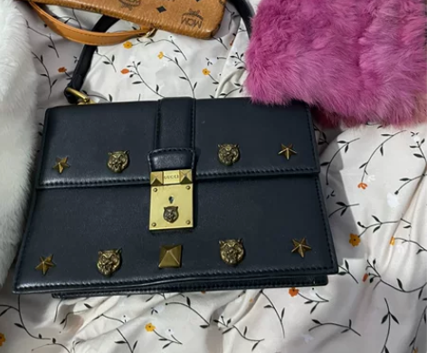 处理包包 mac cucci兔毛手拿包 手...