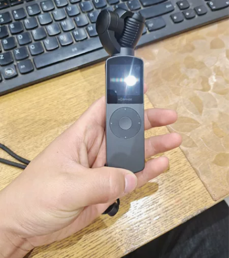 橙影手持云台防抖运动相机，几乎全新，买回来...