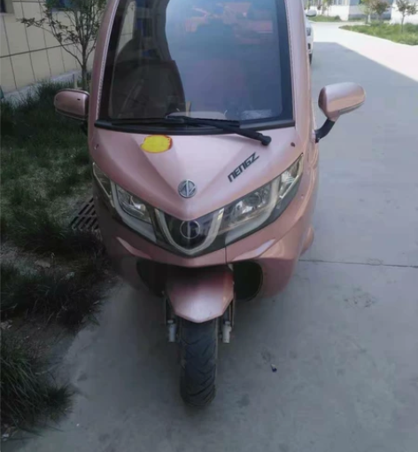 因城市限行低价出售能众封闭式电动车，去年1...