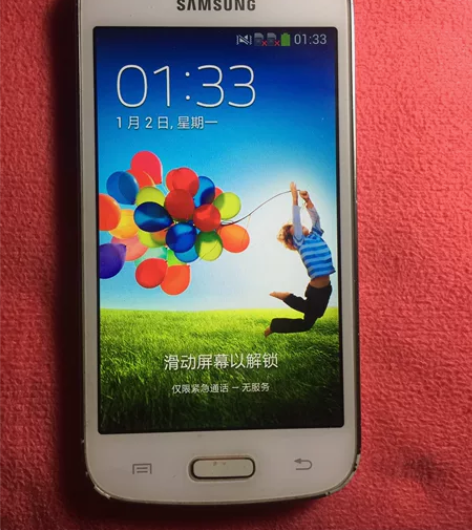 三星手机G3502，一切正常，四边有磨损，...