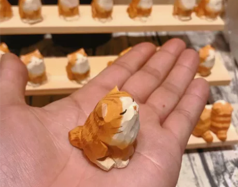 两个橘猫木雕 高3.6cm 感兴趣的话点“...