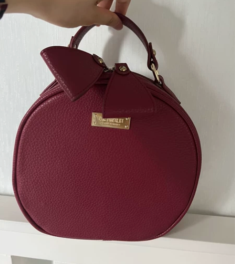 优哈复古红女手提拎包 小圆饼包 感兴趣的话...