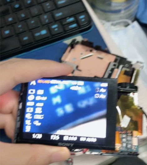 索尼黑卡RX100镜头不能伸缩、报关闭电源...