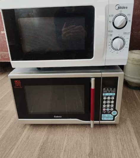 两台微波炉，一台美的，一台格兰仕。 感兴趣...