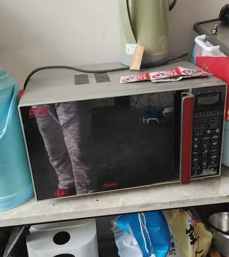 因为我老公在公司抽奖活动抽到了微波炉 感兴...