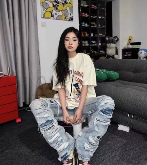 美式复古水洗破洞微喇叭牛仔裤男女宽松vin...