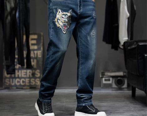 男士虎头绣花春秋季小脚破洞牛仔裤男刺绣潮流...