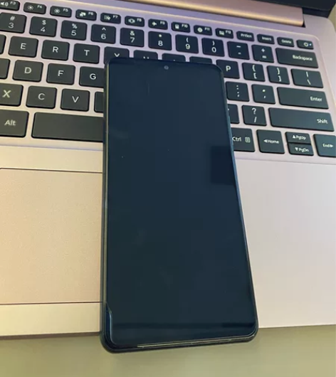 出一台备用机红米K40黑色 成色比较新有轻...