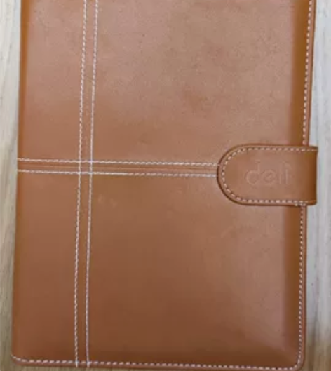 几个记事本，活页的或胶装的，有公司logo...