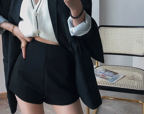 配靴子的毛呢短裤秋冬款黑色加绒裤子女显瘦百...