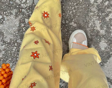 2021早秋新款美式复古奶油黄印花开叉直筒...